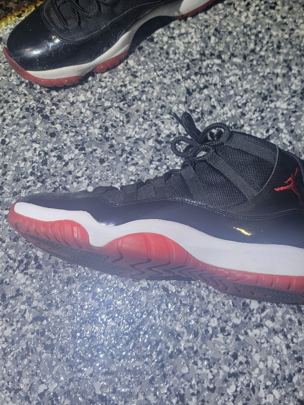 Jordan 11 Men's Black and Red Retro Basketball Sneakers